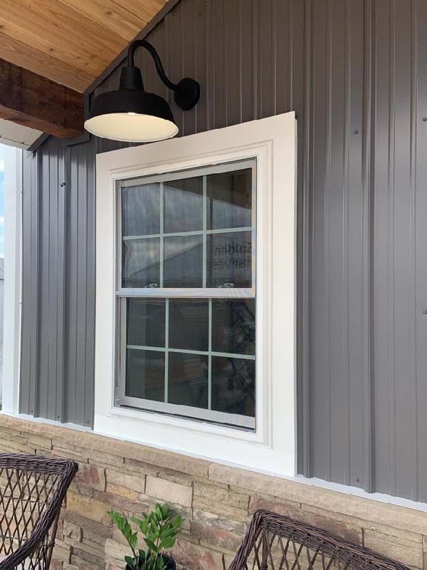 Harmony vinyl double hung with grids in the airspace and nail fin. Photo courtesy of  AJ Manufacturing
