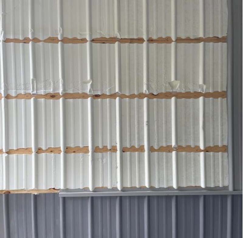 If damaged, steel panels can be pulled off directly applied closed cell spray foam. Photo courtesy of Mike Momb