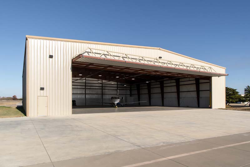 Big Door Retrofits: Upgrading Post-Frame Buildings for Larger Equipment